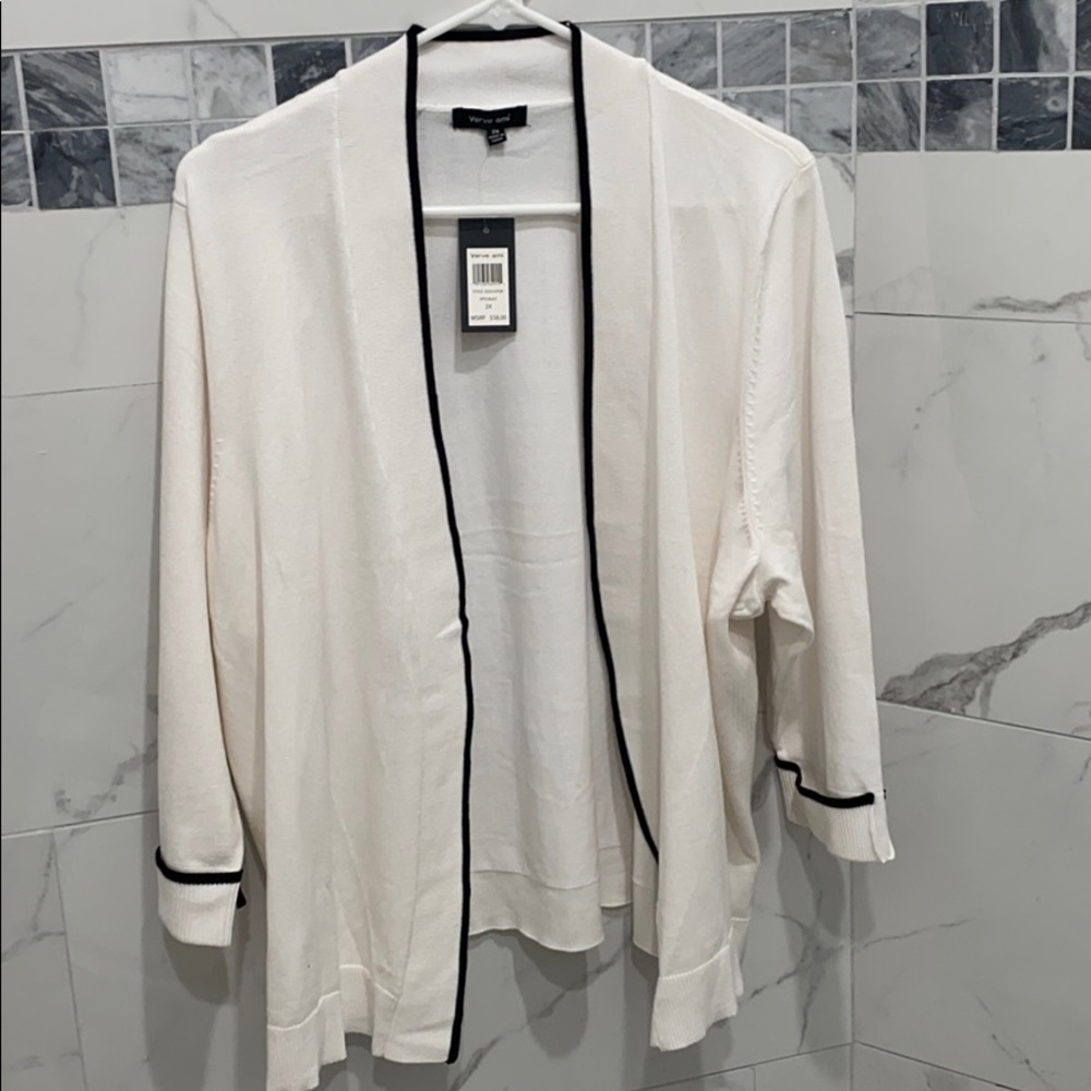 White and black cardigan.